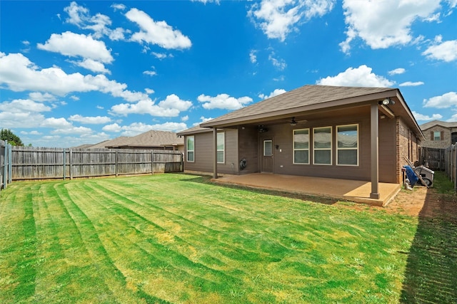 1037 Doe Meadow Dr, Fort Worth, TX 76028 - back of property with a patio, a yard, a fenced backyard, and a ceiling fan