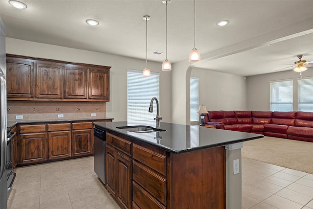 1037 Doe Meadow Dr, Fort Worth, TX 76028 - kitchen featuring a sink, a ceiling fan, dishwasher, light tile patterned floors, and arched walkways