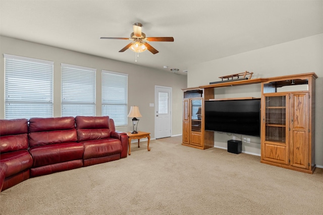 1037 Doe Meadow Dr, Fort Worth, TX 76028 - living area featuring a ceiling fan, light carpet, and baseboards