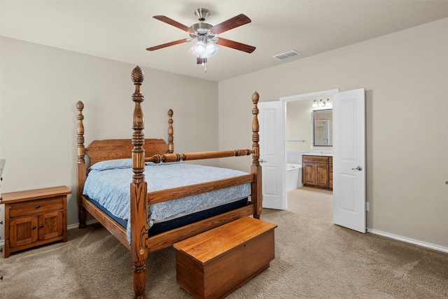 1037 Doe Meadow Dr, Fort Worth, TX 76028 - bedroom featuring light colored carpet, baseboards, ensuite bath, visible vents, and a ceiling fan
