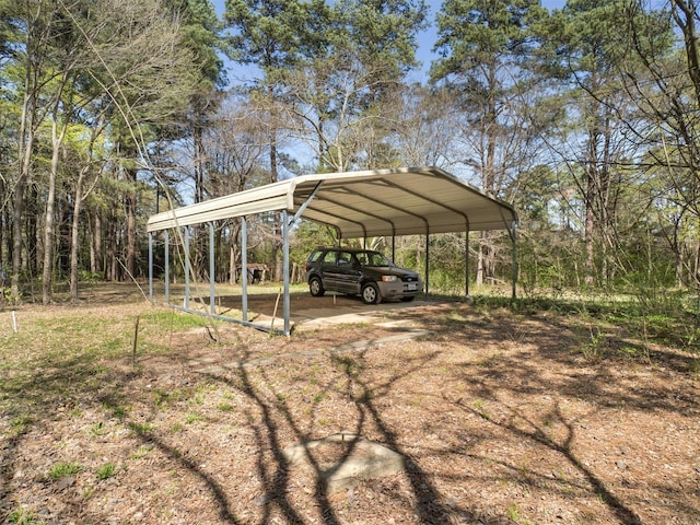 view of parking / parking lot with a detached carport