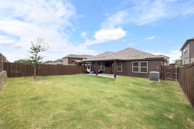816 Adair Dr, Aubrey, TX 76227 - rear view of house with cooling unit, a fenced backyard, a lawn, a patio, and a shingled roof