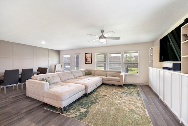 816 Adair Dr, Aubrey, TX 76227 - living room with a decorative wall, dark wood-style floors, and a ceiling fan