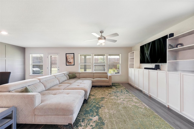 816 Adair Dr, Aubrey, TX 76227 - living room with dark wood-style floors, baseboards, and ceiling fan