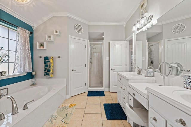 bathroom featuring ornamental molding, a sink, tile patterned flooring, and a shower stall