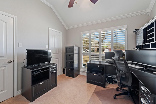 home office with ornamental molding, light carpet, vaulted ceiling, and ceiling fan