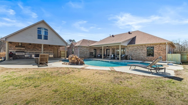 view of pool with a diving board, a ceiling fan, fence, and a patio