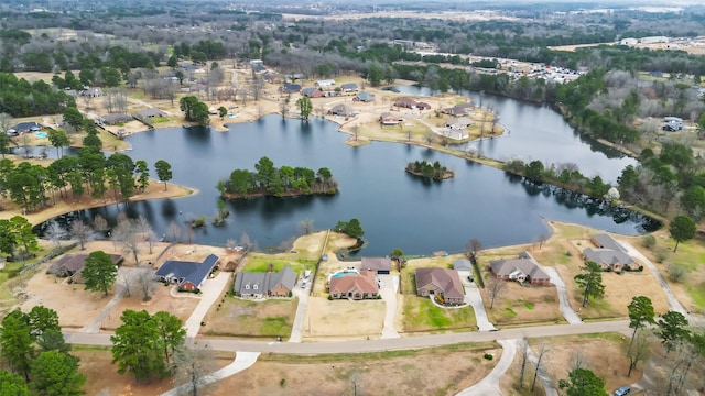 birds eye view of property with a residential view and a water view