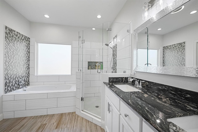 3025 S College Blvd, Denison, TX 75020 - full bathroom with a garden tub, a stall shower, recessed lighting, and vanity