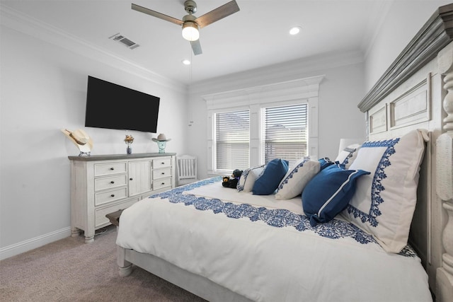 3025 S College Blvd, Denison, TX 75020 - bedroom with crown molding, light colored carpet, baseboards, visible vents, and a ceiling fan