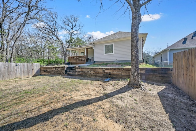 3025 S College Blvd, Denison, TX 75020 - view of front facade featuring a fenced backyard and a porch