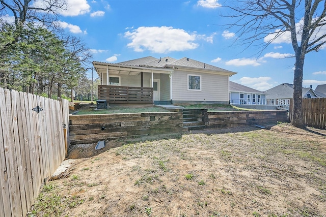 3025 S College Blvd, Denison, TX 75020 - rear view of property featuring a fenced backyard