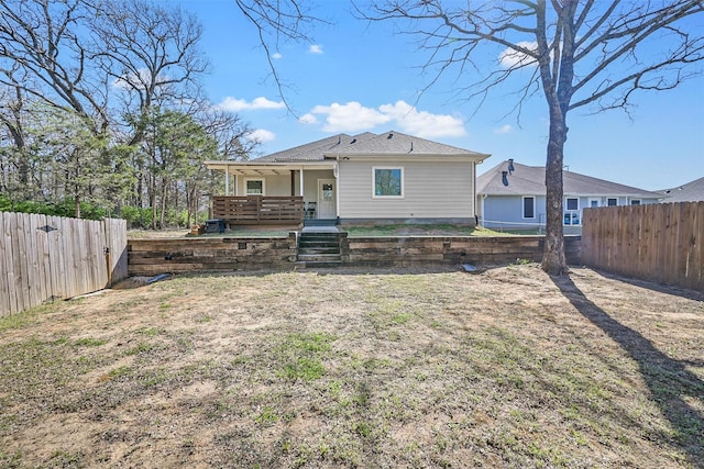 3025 S College Blvd, Denison, TX 75020 - back of property featuring a fenced backyard