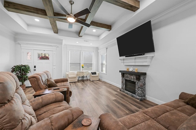 3025 S College Blvd, Denison, TX 75020 - living area with baseboards, wood finished floors, a ceiling fan, and beam ceiling