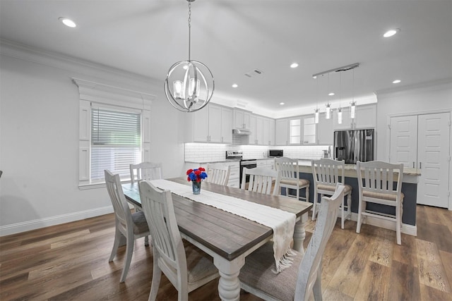 3025 S College Blvd, Denison, TX 75020 - dining room featuring dark wood-style floors, crown molding, a chandelier, and recessed lighting
