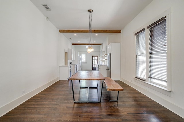 dining space with dark wood-style floors, visible vents, beam ceiling, and baseboards