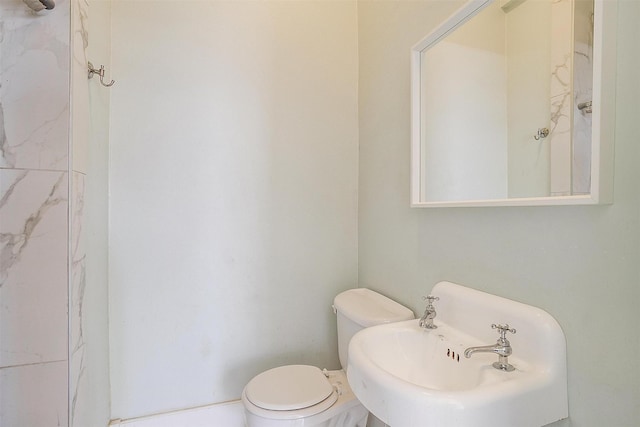 bathroom featuring toilet