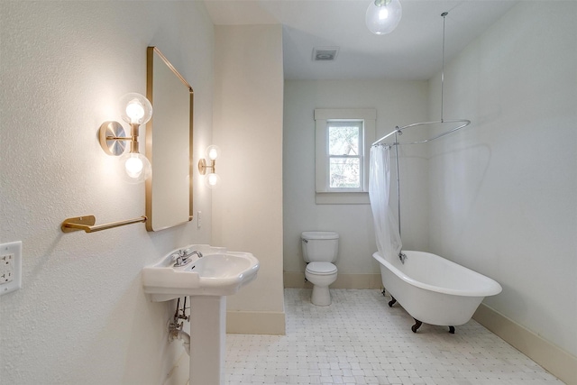 bathroom with visible vents, baseboards, toilet, curtained shower, and a tub