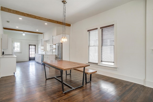 dining room with baseboards, recessed lighting, beamed ceiling, and dark wood finished floors
