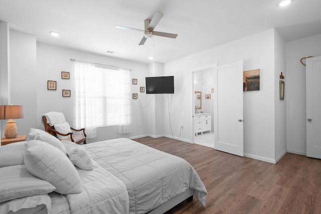 bedroom featuring baseboards, wood finished floors, recessed lighting, and a ceiling fan
