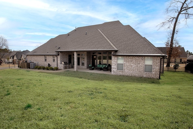 7603 Timber Trl, Tyler, TX 75703 - rear view of house featuring brick siding, a patio area, a shingled roof, and an outdoor hangout area