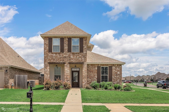 918 Hackberry Dr, Bossier City, LA 71111 - view of front of home with roof with shingles, a front lawn, brick siding, and cooling unit