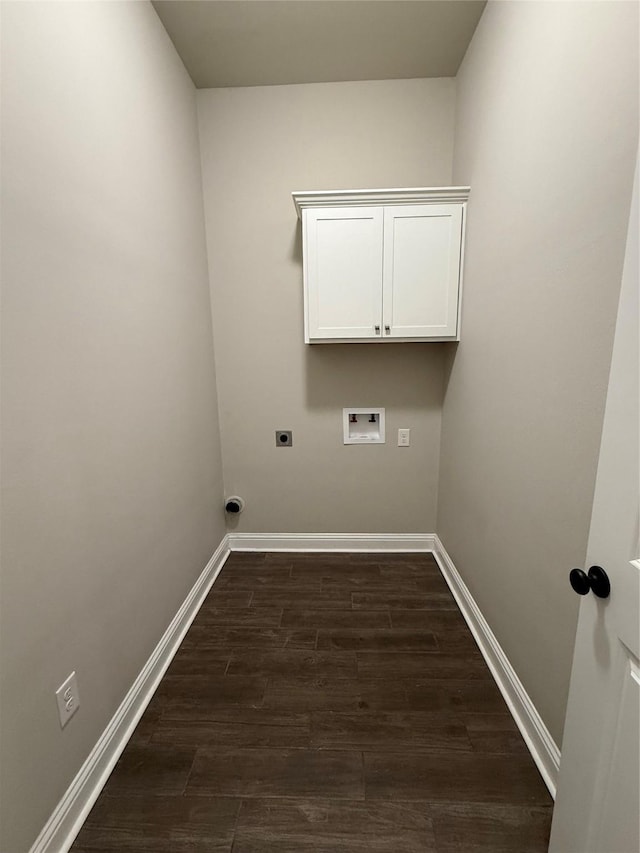 laundry room with electric dryer hookup, dark wood-style flooring, hookup for a washing machine, and baseboards