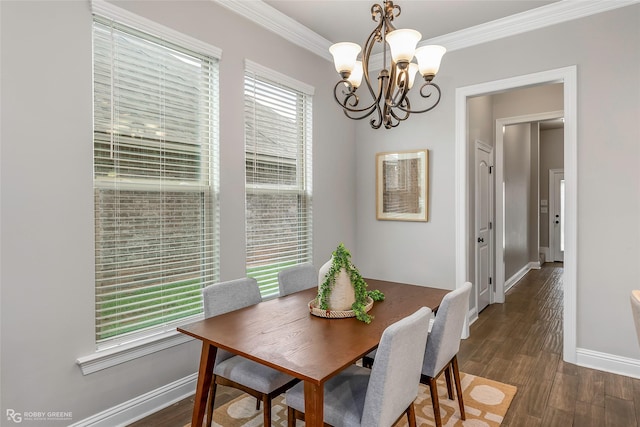 918 Hackberry Dr, Bossier City, LA 71111 - dining space featuring a chandelier, baseboards, ornamental molding, and dark wood-style floors