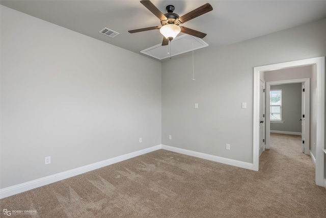 918 Hackberry Dr, Bossier City, LA 71111 - carpeted spare room with attic access, a ceiling fan, and baseboards