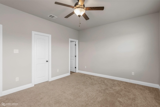 918 Hackberry Dr, Bossier City, LA 71111 - unfurnished bedroom featuring carpet flooring, baseboards, and ceiling fan