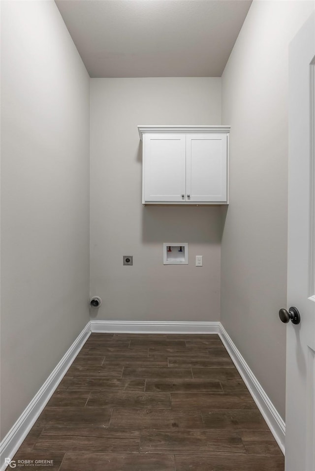 918 Hackberry Dr, Bossier City, LA 71111 - laundry room featuring electric dryer hookup, dark wood-type flooring, washer hookup, baseboards, and cabinet space
