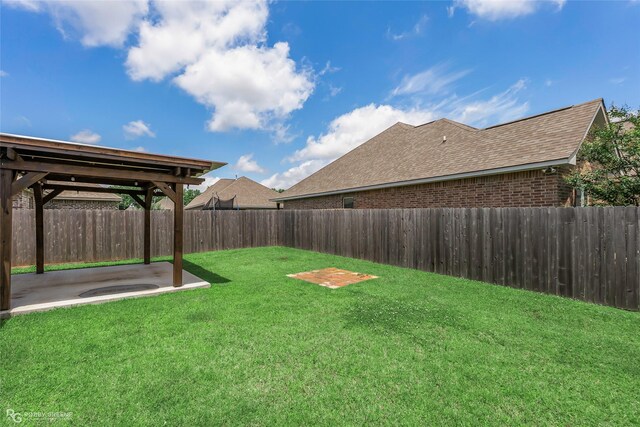 918 Hackberry Dr, Bossier City, LA 71111 - view of yard with a patio