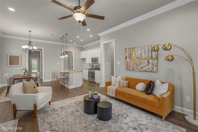 918 Hackberry Dr, Bossier City, LA 71111 - living area with baseboards, ceiling fan, dark wood finished floors, recessed lighting, and a chandelier