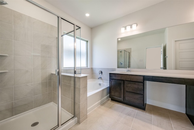 406 Eaton Dr, Justin, TX 76247 - bathroom with a stall shower, a bath, vanity, tile patterned flooring, and recessed lighting