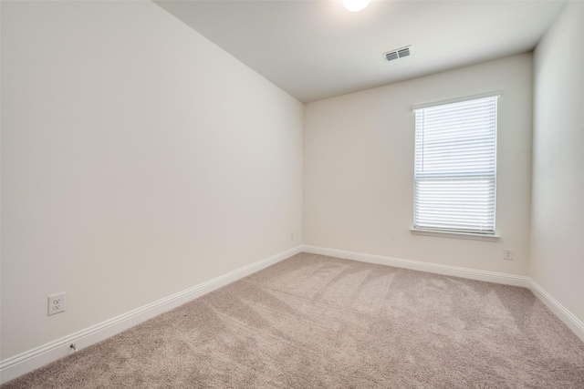 406 Eaton Dr, Justin, TX 76247 - carpeted spare room with visible vents and baseboards