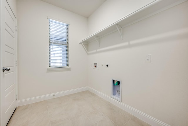 406 Eaton Dr, Justin, TX 76247 - laundry room with laundry area, hookup for an electric dryer, gas dryer hookup, hookup for a washing machine, and baseboards