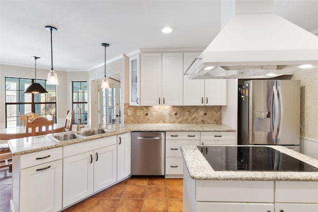 kitchen featuring white cabinets, appliances with stainless steel finishes, a sink, a peninsula, and island range hood