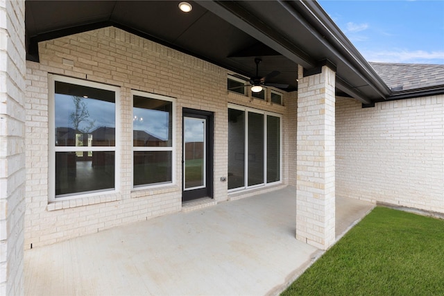 view of patio featuring ceiling fan