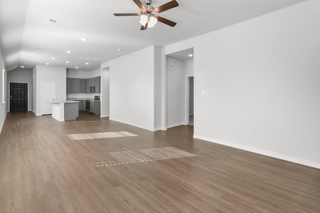 10637 Bleat St, Fort Worth, TX 76036 - unfurnished living room featuring a ceiling fan, recessed lighting, dark wood-style flooring, and baseboards