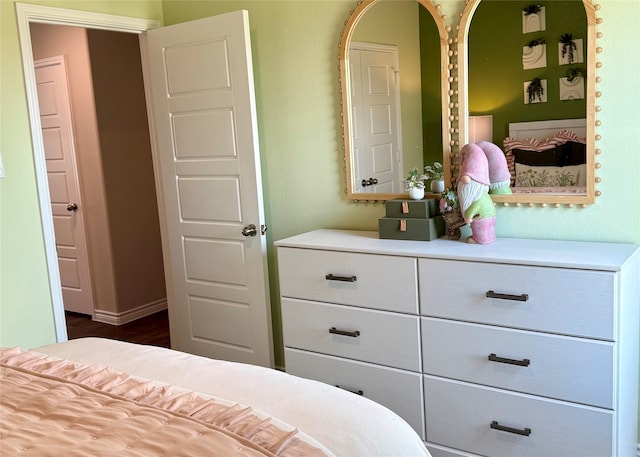 5056 Cervinae Rd, Fort Worth, TX 76036 - bedroom featuring dark wood finished floors and baseboards