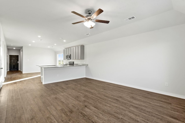 5056 Cervinae Rd, Fort Worth, TX 76036 - unfurnished living room featuring dark wood finished floors, a ceiling fan, baseboards, and recessed lighting