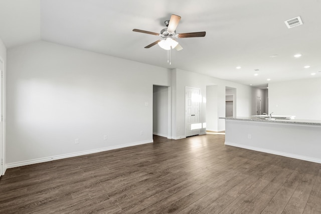 5056 Cervinae Rd, Fort Worth, TX 76036 - unfurnished living room with dark wood finished floors, a ceiling fan, recessed lighting, baseboards, and a sink