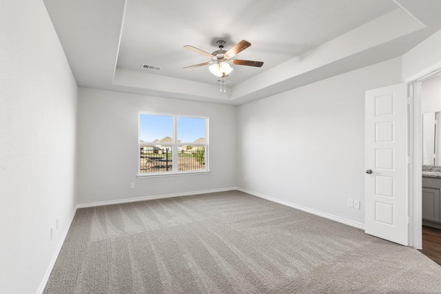 5056 Cervinae Rd, Fort Worth, TX 76036 - carpeted empty room featuring a raised ceiling, a ceiling fan, and baseboards