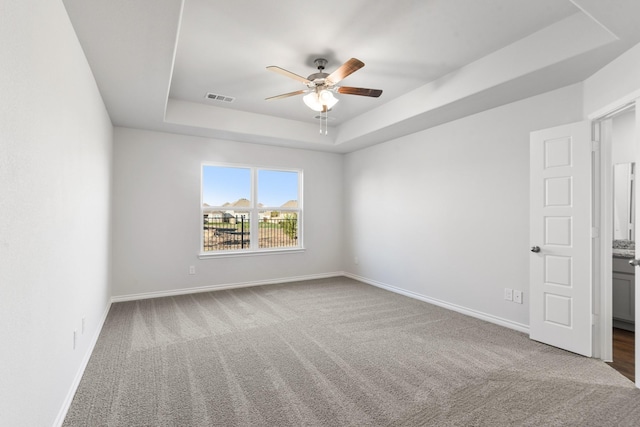 5056 Cervinae Rd, Fort Worth, TX 76036 - unfurnished room featuring a raised ceiling, ceiling fan, carpet, and baseboards