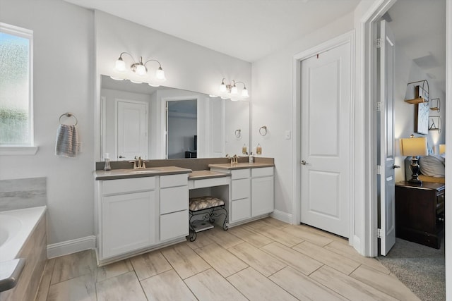 4529 Tolkien Ave, Celina, TX 76227 - full bath featuring vanity, a bath, and baseboards