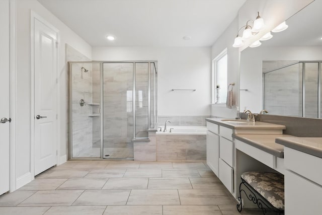 4529 Tolkien Ave, Celina, TX 76227 - bathroom featuring vanity, a bath, a shower stall, and recessed lighting