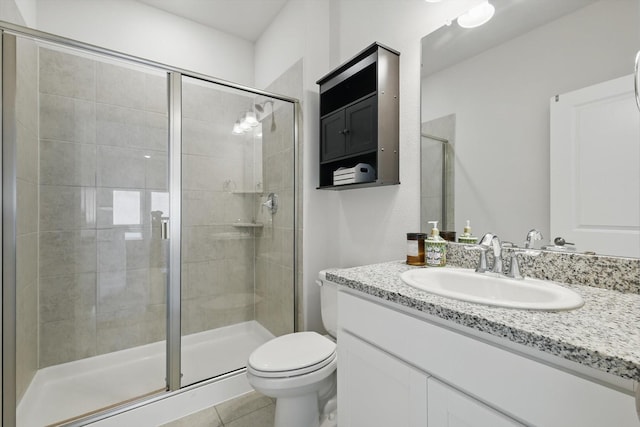 4529 Tolkien Ave, Celina, TX 76227 - bathroom with vanity, a stall shower, toilet, and tile patterned floors