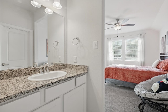 4529 Tolkien Ave, Celina, TX 76227 - bathroom featuring connected bathroom, vanity, ceiling fan, and lofted ceiling