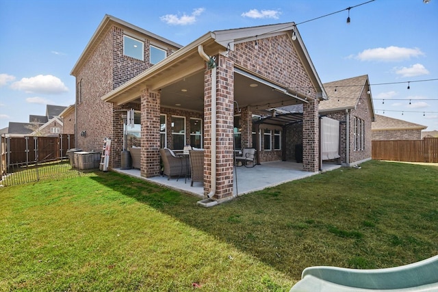 4529 Tolkien Ave, Celina, TX 76227 - rear view of property with brick siding and a patio area