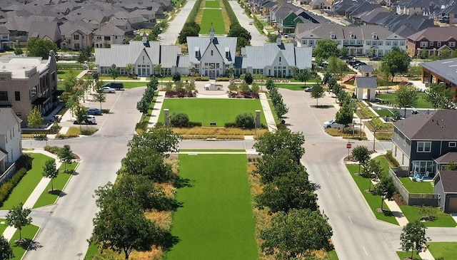 birds eye view of property with a residential view